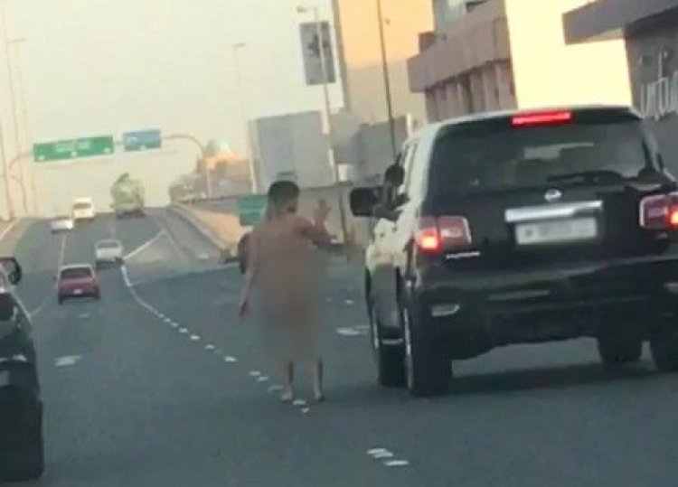عاجل: القبض على سيدة تتجول بدون ملابس في شارع بالبحرين شاهد الفديو