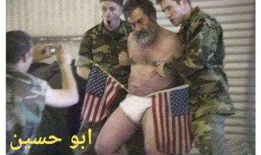 جندي امريكي ينشر صورة جديدة مهينة لصدام حسين
