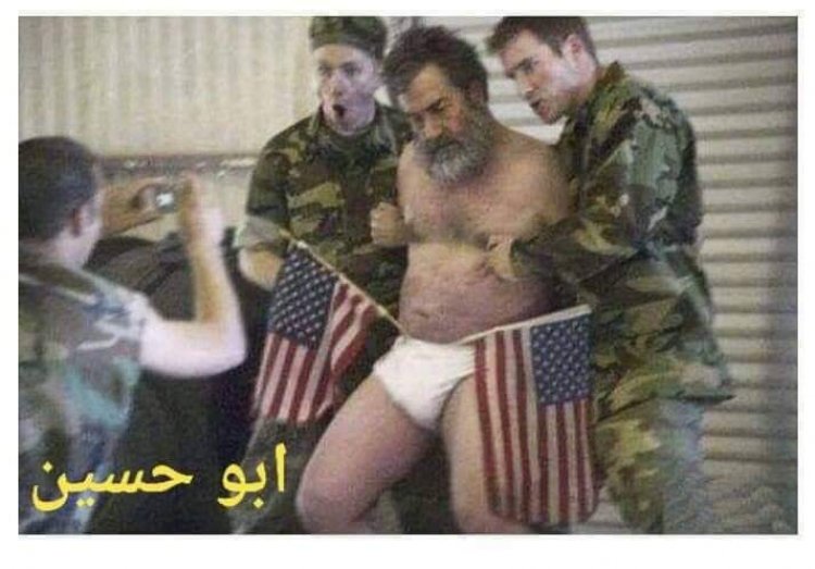 جندي امريكي ينشر صورة جديدة مهينة لصدام حسين